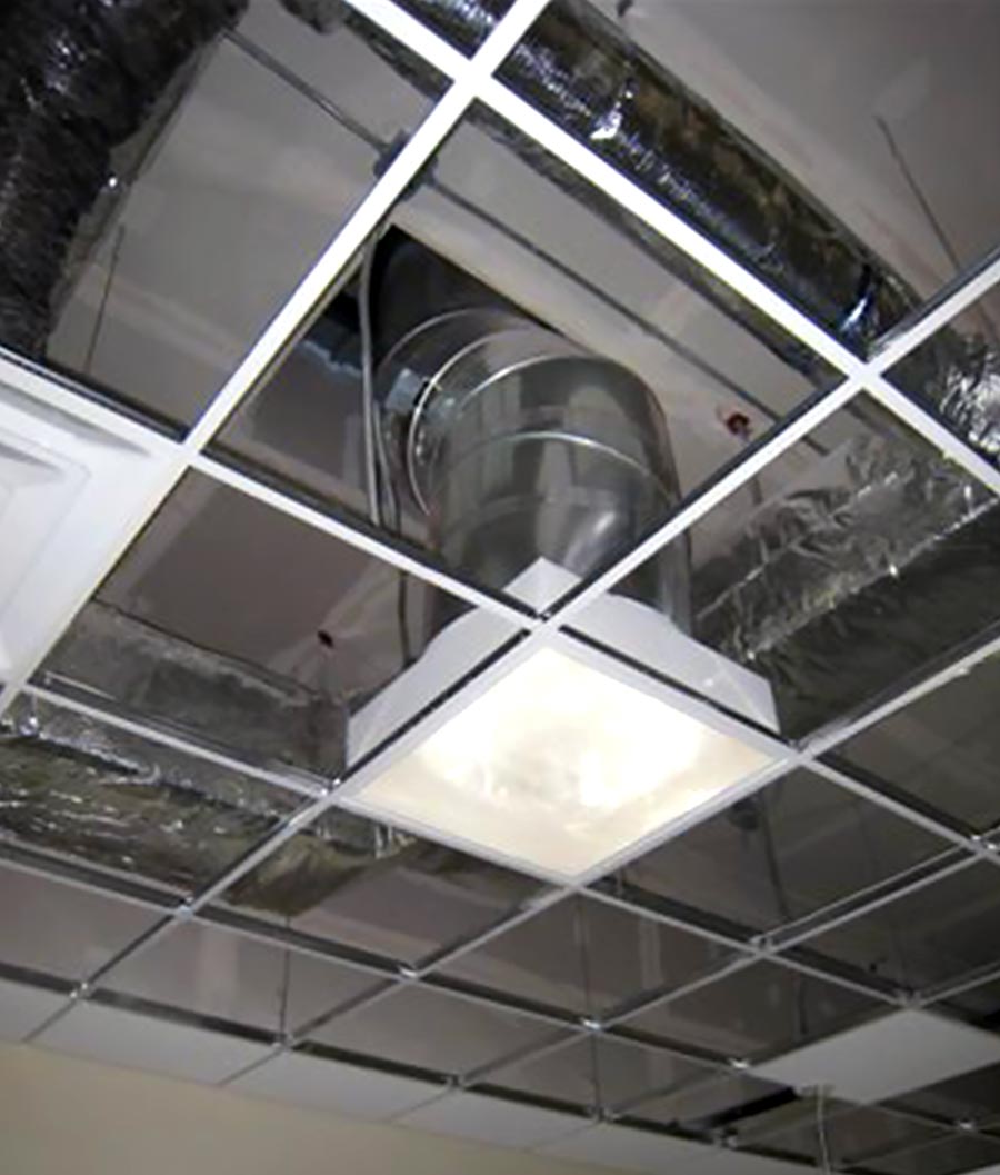 Natural Light tubular skylight during installation in drop ceiling grid system