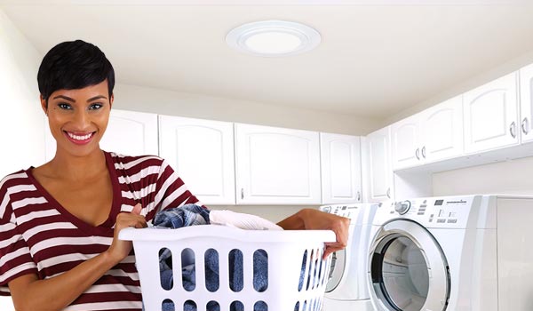 Woman under Natural Light exhaust vent in laundry room mobile